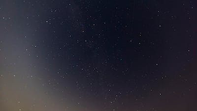 With low visibility and heavy humidity a meteor is barely visible on the top right side of the frame appearing as a thin line. Antonie Robertson/The National