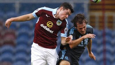 Burnley's Michael Keane and Real Sociedad's Jon Bautista in action. (Reuters/Jason Cairnduff)