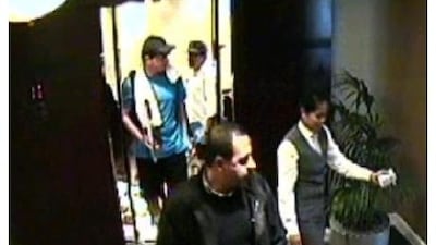 In an image captured by a CCTV camera in the Al Bustan Rotana in Dubai, Mahmoud al Mabhouh, front, is followed by two men suspected of involvement in his murder on January 19. AFP Photo