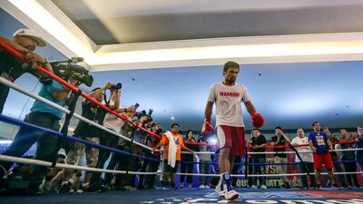 Manny Pacquiao takes part in a training session at a gym in Kuala Lumpur ahead of his WBA world welterweight bout against Argentina's Lucas Matthysse on July 15. EPA