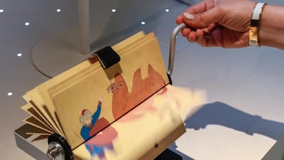 Art you can touch! A flipbook of a man feeding a camel in the new Louvre Abu Dhabi children's museum. Victor Besa / The National