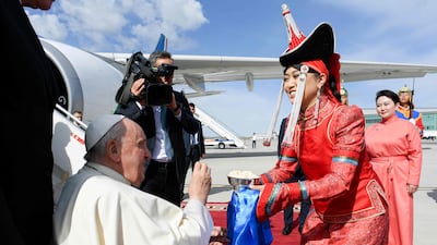 Mongolia's Minister of Foreign Affairs Batmunkh Battsetseg welcomes the Pope Francis to Ulaanbaatar. AFP