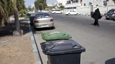 Recycling and rubbish bins in the old Mushrif neighbourhood in Abu Dhabi. Under Tadweer’s plans, the emirate will be split into zones for the major types of waste they produce. Silvia Razgova / The National