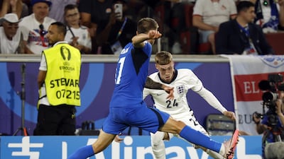 England substitute Cole Palmer takes on Jan Mlakar of Slovenia. EPA