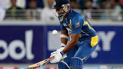 Sri Lankan batsman Kumar Sangakkara joined an elite group of cricketers on Saturday when he became only the fifth to make 12,000-runs in his career. Satish Kumar / The National