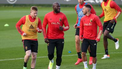 Kevin De Bruyne, Romelu Lukaku and Eden Hazard warm up during a training session. AFP
