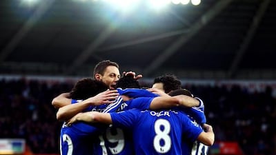 Chelsea celebrateafter Oscar scores his team’s fourth goal during the Barclays Premier League match between Swansea City and Chelsea at Liberty Stadium on January 17, 2015 in Swansea, Wales. Getty Images