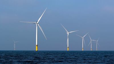 Power-generating windmill turbines at an offshore wind farm near Amsterdam, the Netherlands. Reuters