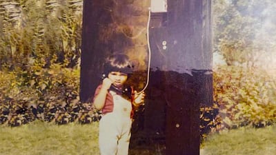 Having lived in the UAE her whole life, Delaine D'Costa used to love wandering the Corniche and play in the old phone booths. Courtesy Etihad