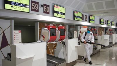 A worker disinfects an area at the Mohammed V airport in Casablanca, Morocco. AP Photo