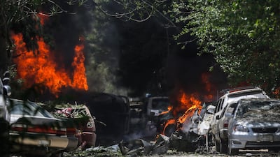 Flames rise after a bomb blast near the office of a Non-Government Organisation and Attorney General's office, in Kabul, Afghanistan. EPA