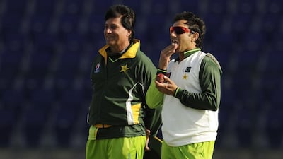 Pakistan's Saeed Ajmal is licking his fingers in anticipation. Philip Brown / Reuters
