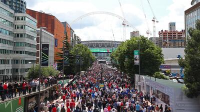 Fans walk up Wembley way towards the stadium prior to the The Community Shield final. Dan Istitene / Getty Images