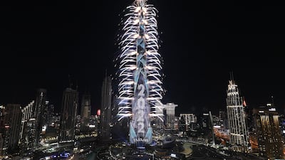 Fireworks are released from the building’s surface to mark the new year. EPA