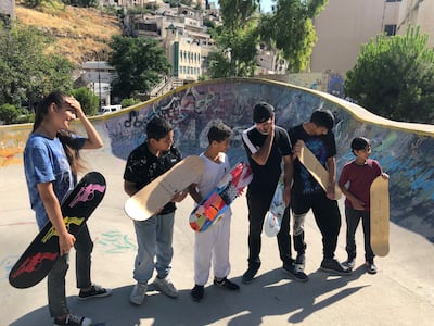 Children receive skateboards to practise on at the 7Hills park but must return them when they go home. Khaled Yacoub Oweis / The National