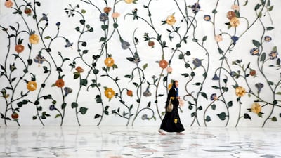 A visitor at Sheikh Zayed Grand Mosque in April 2008. Jaime Puebla / The National