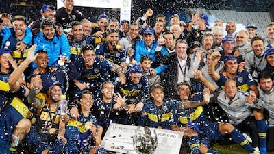 Players of Boca Juniors celebrate winning with the Supercopa Argentina. Getty Images