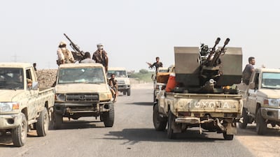 Pro-government troops, armed and on the road, south of Hodeidah in Yemen. AFP