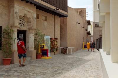 Dubai's Al Fahidi Historical Neighbourhood is known for its narrow passageways, traditional courtyard houses and wind towers. Jeffrey E Biteng / The National