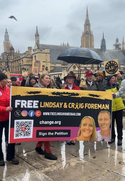 Family and friends deliver a petition to the UK government on Wednesday, calling for the release of Lindsay and Craig Foreman. Lemma Shehadi / The National