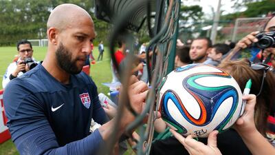 US goalkeeper Tim Howard signs autographs in Sao Paulo, Brazil. Kevin Cox/Getty Images