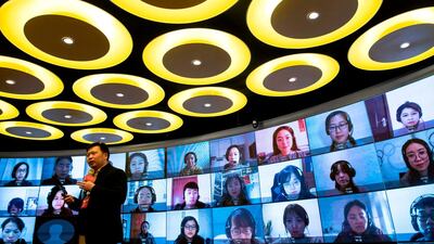 Teacher Wang Guanxin of the ITutorGroup instructing other teachers how to teach online in Shanghai. Demand for e-learning services grew 6.5 per cent last year, according to Fros & Sullivan, but has surged since February with the onset of the coronavirus keeping schoolchildren confined to their homes. AFP