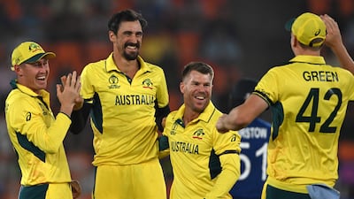 Australia's Mitchell Starc, second left, has taken 10 wickets during the World Cup in India while spinner Adam Zampa leads the bowling charts with 22. AFP