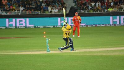 A Peshawar Zalmi batsman is bowled out during their Pakistan Super League T20 match against Islamabad United on Friday. Photo Courtesy / PSL