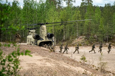 British paratroopers training close to the Russian border in Finland. PA