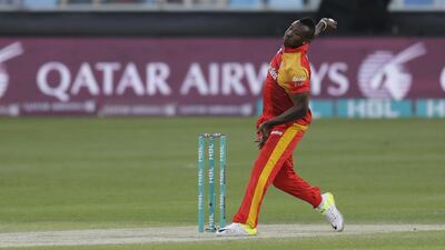 Andree Russele (Islamabad United) bowls against Karachi Kings, at their ongoing HBL Pakistan Super League cricket tournament, held at the Dubai International Cricket Stadium. ( Jeffrey E Biteng / The National )