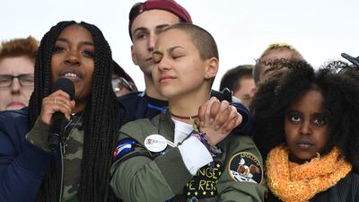 Marjory Stoneman Douglas High School student Emma Gonzalez listens with other students during the March for Our Lives Rally in Washington, in 2018. AFP