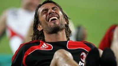 Paolo Maldini grimaces during training. The Italy legend retires after this season.