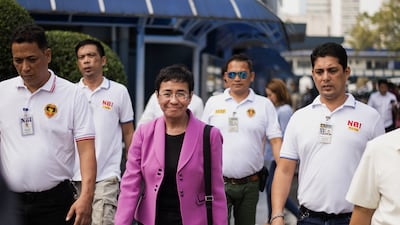Ressa arrives at the headquarters of the National Bureau of Investigation in Manila for questioning, in January 2018. AFP