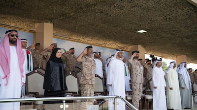 Sheikh Mohammed bin Zayed, fourth left, with Sheikh Tahnoon bin Zayed, UAE Deputy National Security Advisor and Chairman of the Presidential Aviation Authority, left, Dr Amal Abdullah Al Qubaisi, Speaker of the Federal National Council, second left, Lt General Hamad Thani Al Romaithi, Chief of Staff UAE Armed Forces, third left, Brig Gen Saleh Mohamed Saleh Al Ameri, fifth left, Sheikh Hazza bin Zayed, sixth left, Sheikh Nahyan bin Zayed, Chairman of the Board of Trustees of Zayed bin Sultan Al Nahyan Charitable and Humanitarian Foundation, seventh left, and Mohammed Ahmad Al Bowardi, Undersecretary of the UAE Ministry of Defence, right. Rashed Al Mansoori / Crown Prince Court — Abu Dhabi