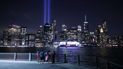 The Tribute In Light shines into the sky from Lower Manhattan during a test. Getty Images / AFP