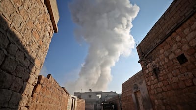 A smoke plume billowing into the air after a reported Russian air strike in the village of Tal Mardikh in Syria's northwestern Idlib province. AFP