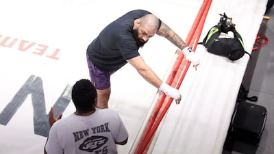 Pouya Rahmani takes a breather during a striking session with his coaches.