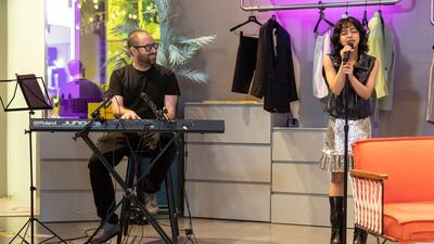 Sachii performs accompanied by a keyboardist.