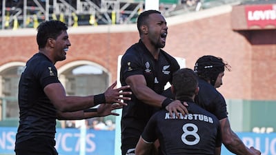 New Zealand men's rugby team celebrate beating England. AFP