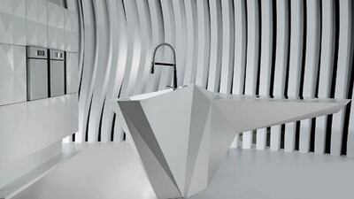 The designer Karim Rashid’s highly sculpted Origami Island features sharp asymmetrical lines.
