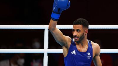 Galal Yafai of Team Great Britain celebrates winning gold in the men's flyweight boxing.