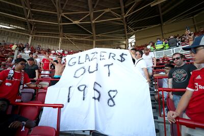 A banner reading 'Glazers Out 1958' is seen during the match between Brentford and Manchester United. Getty