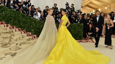 Rosie Huntington-Whiteley and Lily Aldridge arrive for the 2018 Met Gala on May 7, 2018, at the Metropolitan Museum of Art in New York. AFP