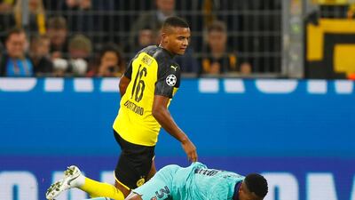 Barcelona's Anssumane Fati falls to the ground. Reuters