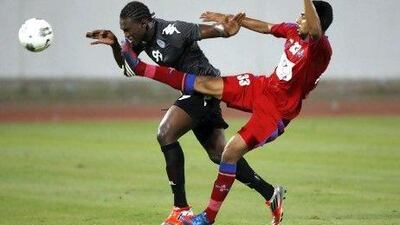 Al Dhafra's Makhete Diop, left, will be keen for an encore after troubling lower-division sides and play-off rivals in the UAE.