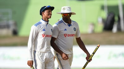 Yashasvi Jaiswal, left, and Ravichandran Ashwin after India's win in the first Test against the West Indies in Dominica on Friday, July 14, 2023. AFP