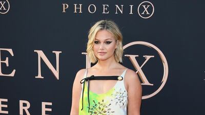 Olivia Holt in Prada at the world premiere of Dark Phoenix at the TCL Chinese Theatre IMAX in Hollywood, Los Angeles