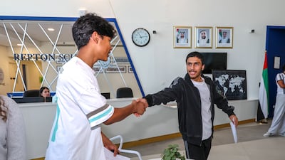 Two pupils congratulate each other