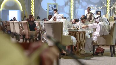 Guests enjoy suhoor at a tent at the Emirates Palace Hotel. Victor Besa/The National