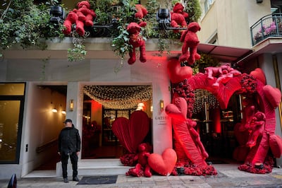 A man stands in front of the hotel where Dana Eden's body was found. AFP